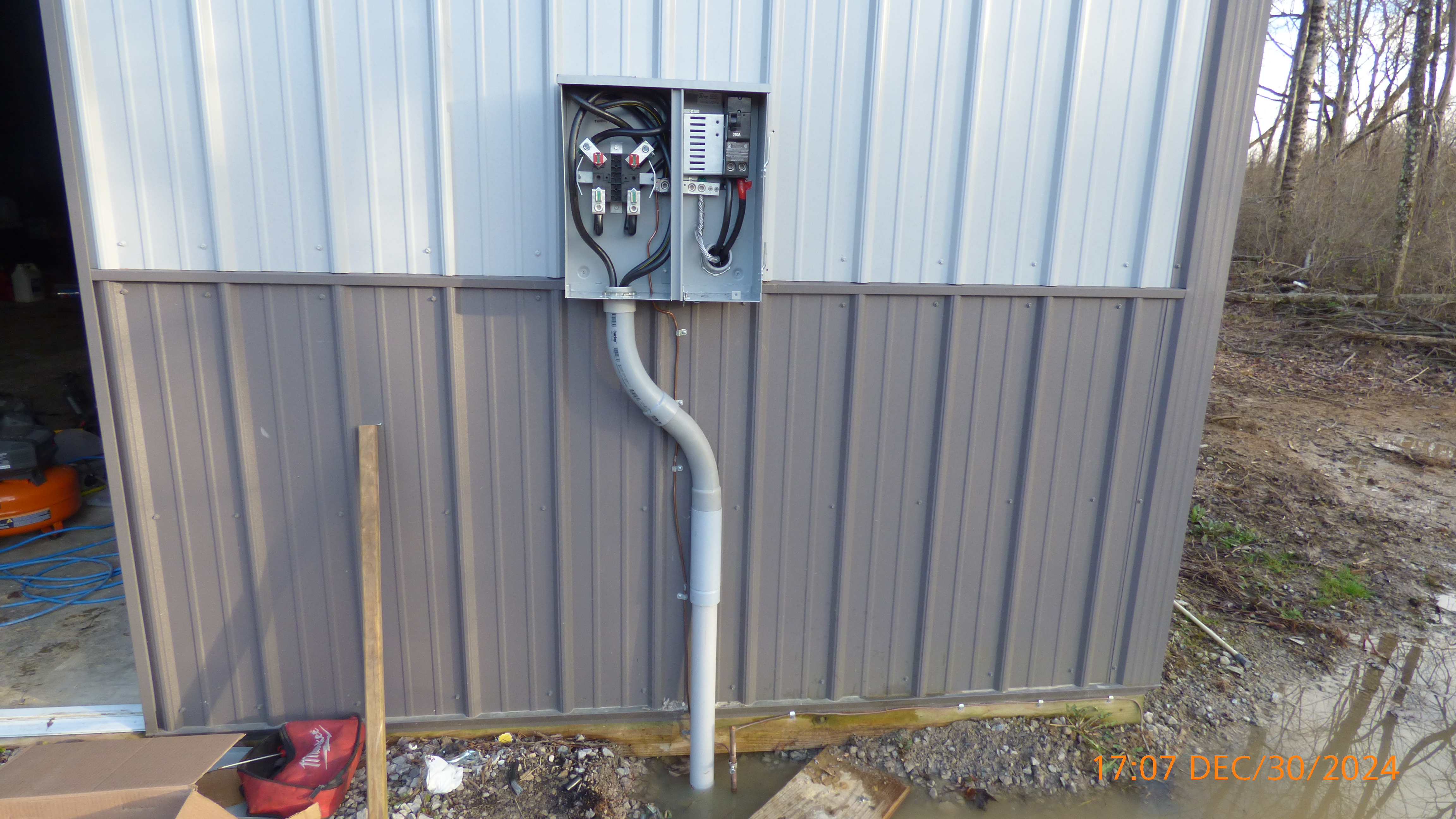 SERVICE INSTALL FROM DUKE ENERGY TO METER BASE WITH COVER OFF, WIRES TERMINATED